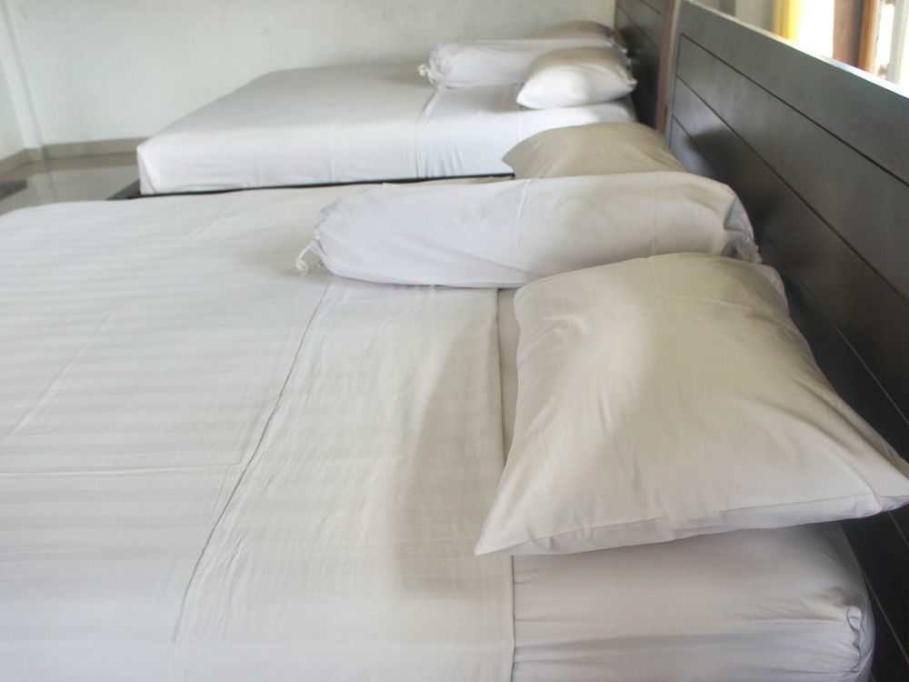 Putu Guest House Чангу Экстерьер фото